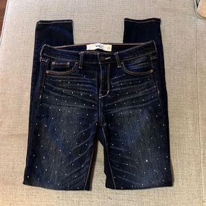 Dark jeans with sparkles down front of leg